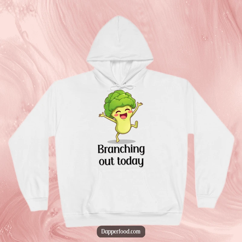 Funny anthropomorphic broccoli floret character mid-cartwheel, bringing vibrant, humorous energy to a warm and cozy hoodie.