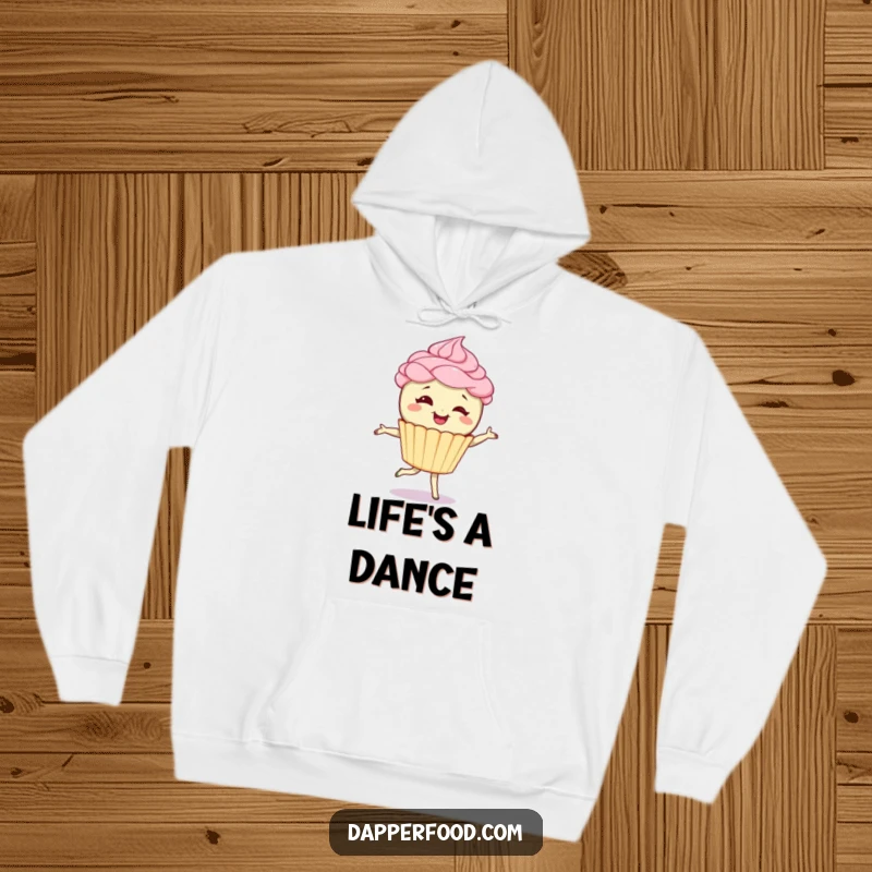 Funny hoodie with a giggling cupcake character sporting frosting hair, doing a pirouette, offering cozy warmth and playful dessert-themed amusement. Perfect funny gift.