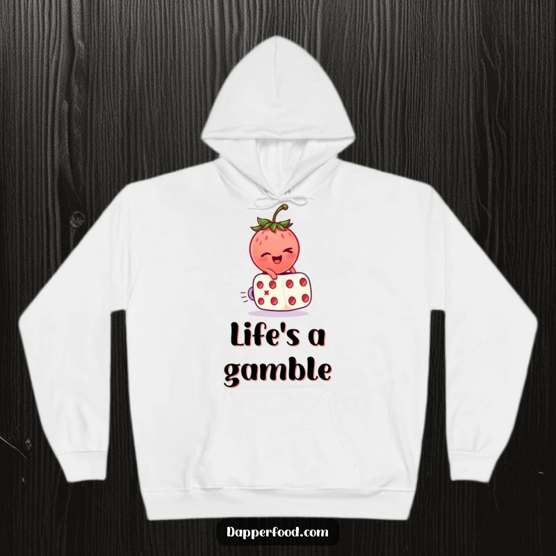 Funny Hoodie featuring a happy strawberry character winking while riding a rolling dice, exuding playful charm.