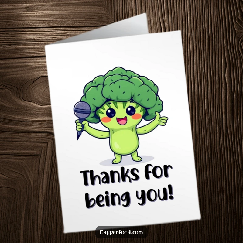 Funny free printable thank you card featuring a proud broccoli floret with arms presenting a tiny microphone, expressing thanks.